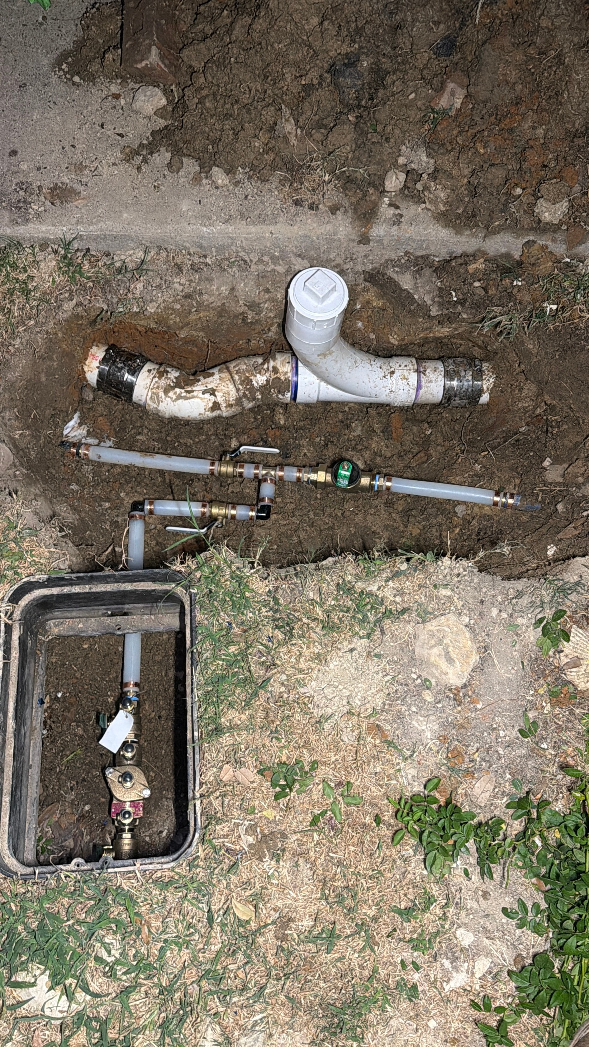 Water line components laid out before installation